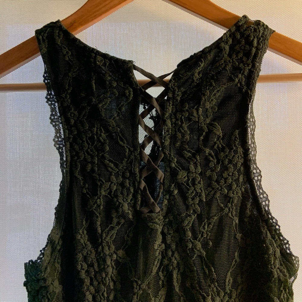 Lacy sleeveless top in a dark olive green.